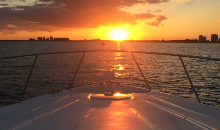 Sunset in Miami seen from the bow of the Black Ice.